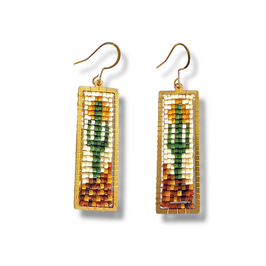 Pair of rectangular beaded earrings on a white background