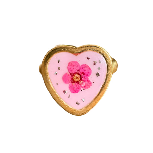 heart shaped ring with pink flower and crushed pyrite.